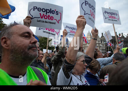 London, UK. 4th September 2019. Anti-brexit protesters demanding a people's vote on this rally on Parliament Square outside the Houses of Parliament, UK. Credit: Joe Kuis / Alamy News Stock Photo