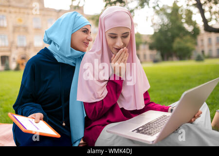 International students searching info in the Internet Stock Photo