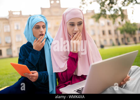 International muslim students studying before classes together Stock Photo