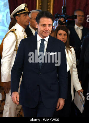 (190905) -- ROME, Sept. 5, 2019 (Xinhua) -- Italian Prime Minister Giuseppe Conte arrives for a swearing-in ceremony at the Quirinale Presidential Palace in Rome, Italy, on Sept. 5, 2019. The new slate of ministers for Giuseppe Conte's second stint as Italy's prime minister was formally sworn in on Thursday by Italian President Sergio Mattarella, bringing the unlikely coalition between Italian populists and an old-guard center-left party a step away from power. (Photo by Alberto Lingria/Xinhua) Stock Photo
