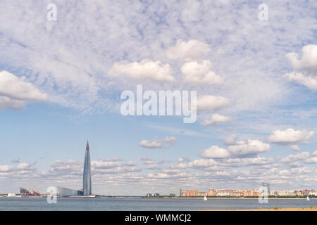 SAINT PETERSBURG. RUSSIA - AUGUST 18 2019. Panoramic landscape with skyscraper 'Lakhta center' (Gazprom headquarters) and cloudy sky at sunny day Stock Photo