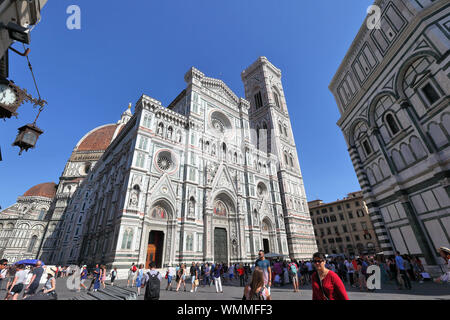 Piazza del Duomo, Florence / Italy - June 20th 2019: Toursits walk around the famous piazza with its maginificant architecture.