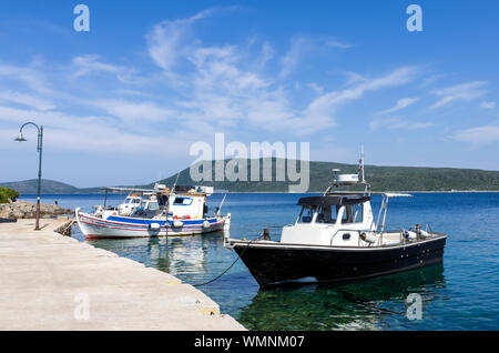 June 15th 2019 - Steni Vala, Alonissos island, Greece - Boats in the picturesque little harbor of Steni Vala, Alonissos island, Greece Stock Photo