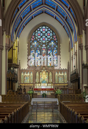 Altar and sanctuary inside of the historic St. Paul's Episcopal Cathedral on Pearl Street in Buffalo, New York Stock Photo