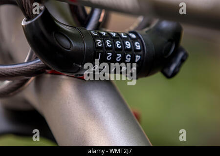 Combination lock on a bicycle closed Anti-theft device Stock Photo