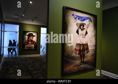 Lima, Peru. 04th Sep, 2019. Portraits of villagers dressed in traditional costumes at the Mate museum during the exhibition in Lima.Mario Testino exhibition 'Alta Moda' is the result of a five-year project that investigates both Peruvian traditions and the history of photography at the Mate museum in Lima. Credit: SOPA Images Limited/Alamy Live News Stock Photo