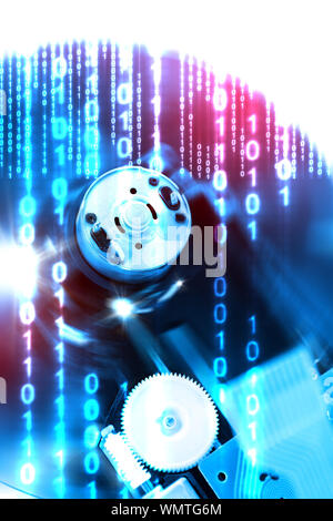 Dvd and cd recorder mechanism.Technology and data background,Binary code. Stock Photo