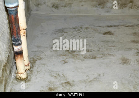 Floor in a bathroom of an apartment just dried after isolation works Stock Photo