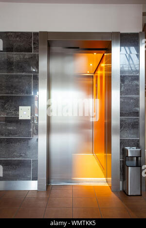 Image showcasing Building Elevator with moving door in apartment complex luxury silver ...