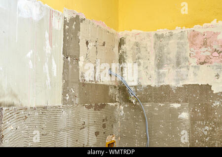 New electric installation in a wall during reconstruction works in an apartment Stock Photo