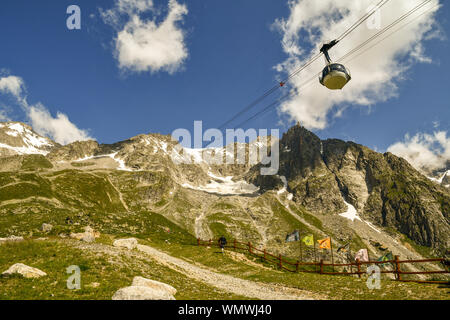 A cabin of the Skyway Monte Bianco cableway bringing tourists to Pointe Helbronner peak (3462 m) in the Mont Blanc massif in summer, Courmayeur, Italy Stock Photo
