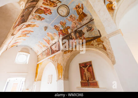 Italy, Apulia, Metropolitan City of Bari, Locorotondo. May 30, 2019. Interior of Saint Nicola Church (Chiesa San Nicola). Recently restored frescoes o Stock Photo