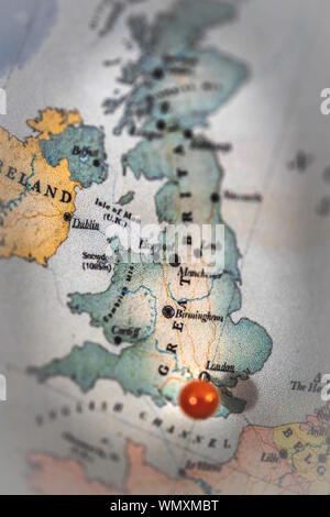 A map of Great Britain with a red pin marking the capital London Stock Photo