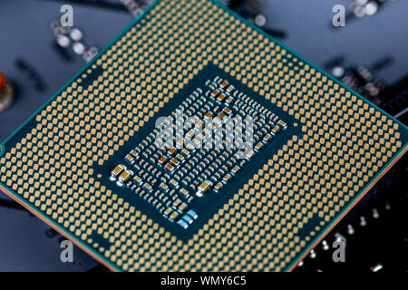 back side of modern lga 1151v2 central processor unit - closeup Stock Photo