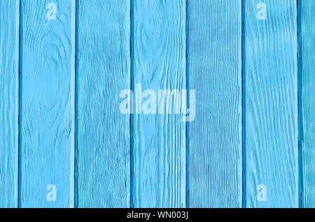 Wooden background texture. Creatively painted intense blue boards. Stock Photo