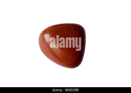 Macro shooting of red Coral mineral or Jasper stone isolated on a white background. Stock Photo