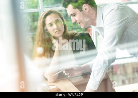 Teamwork business concept .Start up business people in modern office, working together having success. Multiethnic start-up business team on meeting i Stock Photo