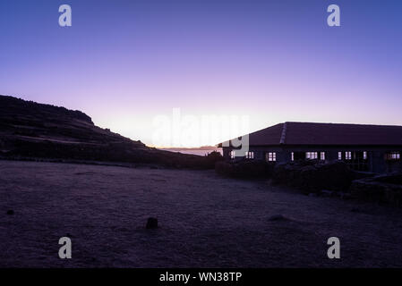 A purple sunrise over Lake Titicaca Stock Photo