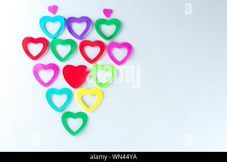 Heart-shaped from Group of colorful hearts on white background. Valentines Day, love, woman and mothers day, healthy lifestyle concept. Stock Photo