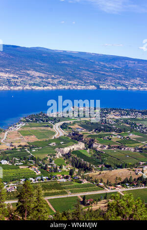 View of agricultural fields, vineyards, and Okanagan Lake from Giants Head Mountain in Summerland, Okanagan Valley, British Columbia, Canada. Stock Photo