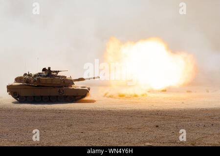 Soldiers in the 1st Battalion, 68th Armor Regiment, 3rd Armored Brigade Combat Team, 4th Infantry Division conduct daytime live fire in an M1 Abrams main battle tank during a combined arms live fire exercise at the end of Exercise Eager Lion 19 in Amman, Jordan, Sept. 5, 2019. Eager Lion is a multilateral exercise designed to exchange military expertise and improve interoperability among partner nations, and is considered the capstone of a broader U.S. military relationship with the Jordan Armed Forces. (U.S. Army National Guard photo by Cpl. Elizabeth Scott) Stock Photo