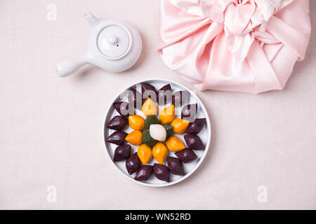 Concept of Korean traditional objects, wrapping cloth and refreshments. 058 Stock Photo