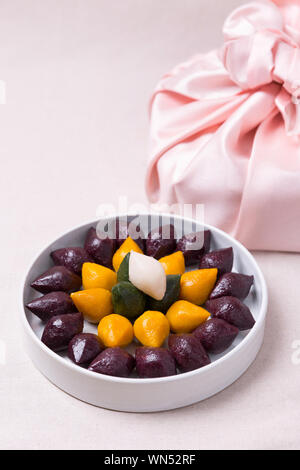 Concept of Korean traditional objects, wrapping cloth and refreshments. 060 Stock Photo