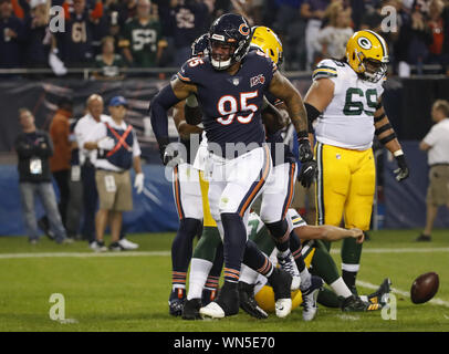 Chicago Bears' Roy Robertson-Harris sacks Green Bay Packers' Aaron Rodgers  during the first hal …