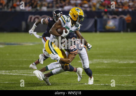 Chicago, United States. 05th Sep, 2019. Green Bay Packers wide receiver Marquez Valdes-Scantling (83) is tackled by Chicago Bears cornerback Kyle Fuller (23) during the first half of an NFL game at Soldier Field in Chicago on Thursday, September 5, 2019. Photo by Kamil Krzaczynski/UPI Credit: UPI/Alamy Live News Stock Photo