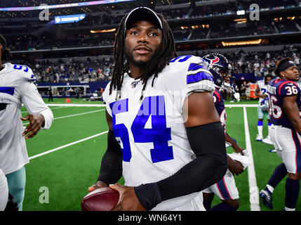 August 24th, 2019:.Dallas Cowboys linebacker Jaylon Smith (54) and Houston  Texans linebacker Jamal Davis II (49) during an NFL football game between  the Houston Texans and Dallas Cowboys at AT&T Stadium in