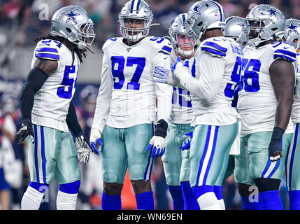 August 24th, 2019:.Dallas Cowboys defensive end Taco Charlton (97) recovers  a fumble during an NFL football game between the Houston Texans and Dallas  Cowboys at AT&T Stadium in Arlington, Texas. Manny Flores/CSM