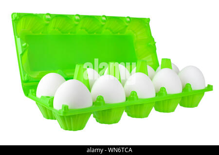 Dozen white eggs in open green plastic package on white background isolated close up side view, eco friendly color design, healthy food concept Stock Photo