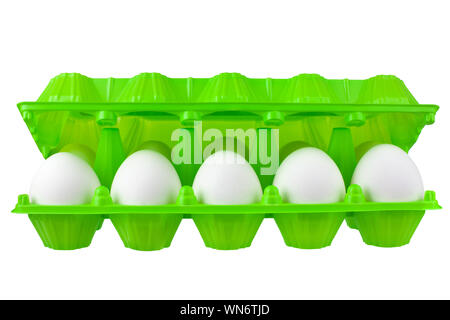 Dozen white eggs in open green plastic package on white background isolated close up side view, eco friendly color design, healthy food concept Stock Photo