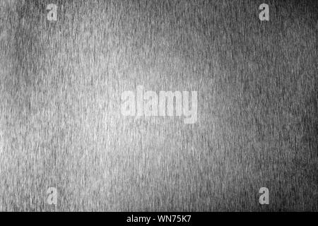 Silver metal shiny empty surface, monochrome shining metallic background, brushed black and white iron sheet backdrop close up, gray steel texture Stock Photo