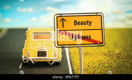 Street Sign the Direction Way to Beauty versus Ugliness Stock Photo
