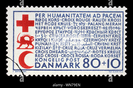 Stamp printed in Denmark shows Red Cross and Red Crescent, circa 1966 Stock Photo