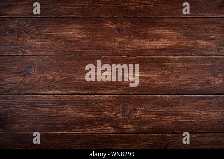Realistic wooden background or natural brown color table top. Old scuffed and scratched surface. Stock Photo