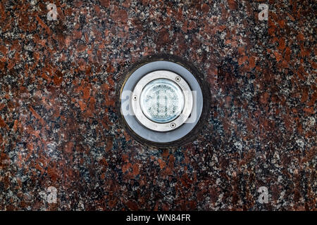 LED backlight in granite stone. Light fixture. Stock Photo