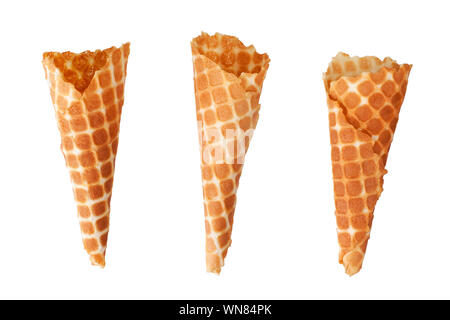 Ythee golden crispy ice-cream waffle cones on white background isolated close up Stock Photo