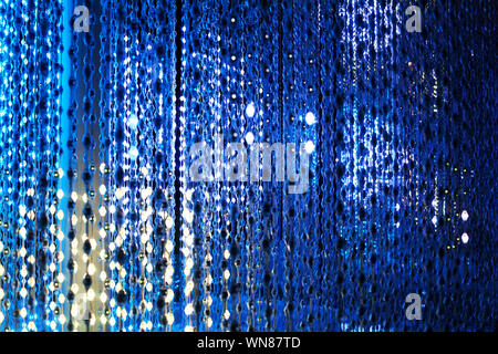 Blue neon lights background, abstract glitter bright light closeup, club festive party poster design, holiday blinking backdrop, beautiful sparkling Stock Photo