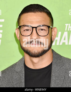 HOLLYWOOD, CA - SEPTEMBER 04: Cub Swanson (L) and Kenda Perez attend