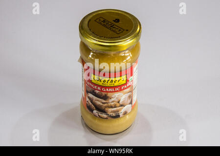 Phuket, Thailand - August 1st 2019: Glass jar of Mothers Recipe ginger garlic paste. The brand specialises in Indian ethnic foods Stock Photo