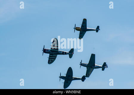 Clacton   United Kingdom 23 August  2019  -:  World war two fighters in formation at Clacton airshow Stock Photo