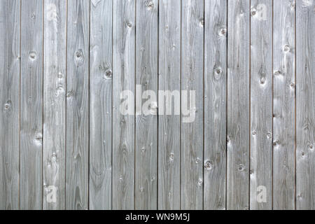 Gray wooden wall made of vertical boards Stock Photo