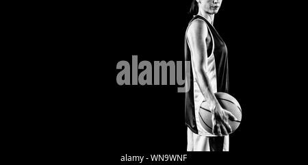 Tough female basketball player Stock Photo