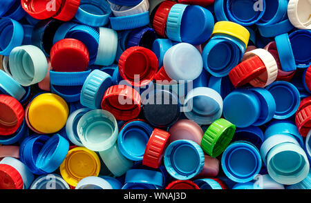 Photo of many, colorful plastic bottle caps Stock Photo