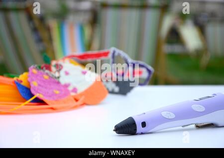 3d handle pen and 3d painting figures. Concept of andmade STEM education - New toy for child to Play and study at school and home Stock Photo