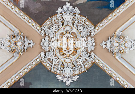 CATANIA, ITALY - APRIL 6, 2018: The detail of baroque stucco on the ceiling of church Basilica Maria Santissima dell'Elemosina. Stock Photo