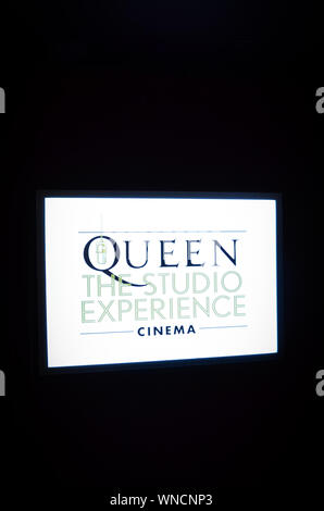 Montreux, Switzerland - July 26, 2019: Illuminating screen with sign Queen, The Studio Experience, Cinema. Taken in Montreux Casino, where the famous band recorded their albums. Public exhibition. Stock Photo