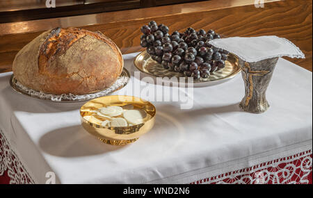 The bread and wine - catholic mass - the symbols of eucharist. Stock Photo